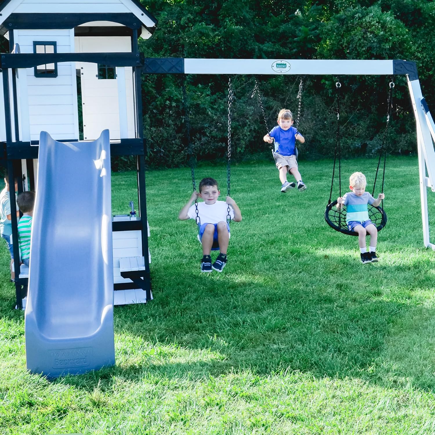 Backyard Discovery Canyon Creek Cedar Wood Swing Set with Wave Slide, Clubhouse, Play Kitchen, Picnic Area, Swings and Rock Wall