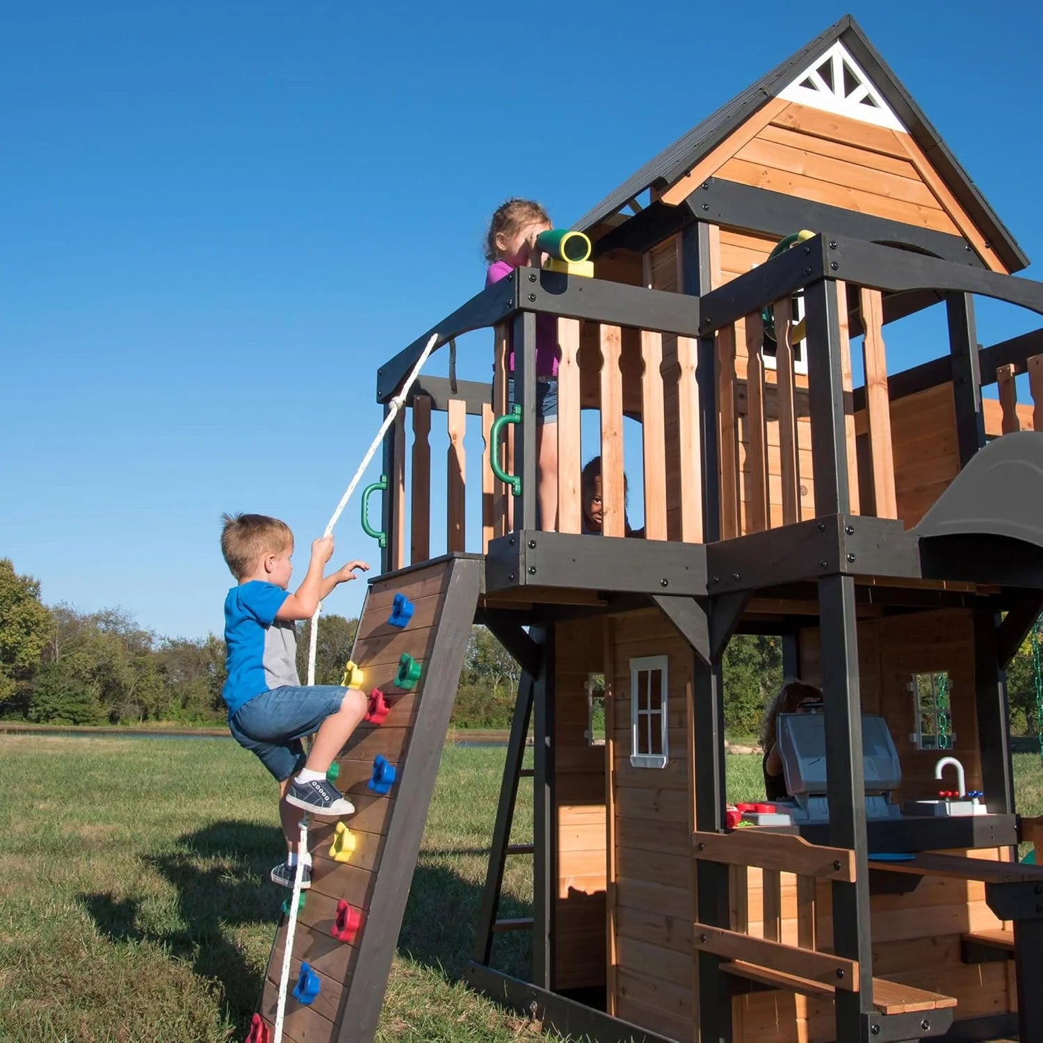 Backyard Discovery Canyon Creek Cedar Wood Swing Set with Wave Slide, Clubhouse, Play Kitchen, Picnic Area, Swings and Rock Wall
